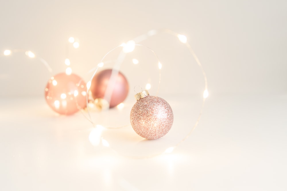 a couple of ornaments sitting on top of a table