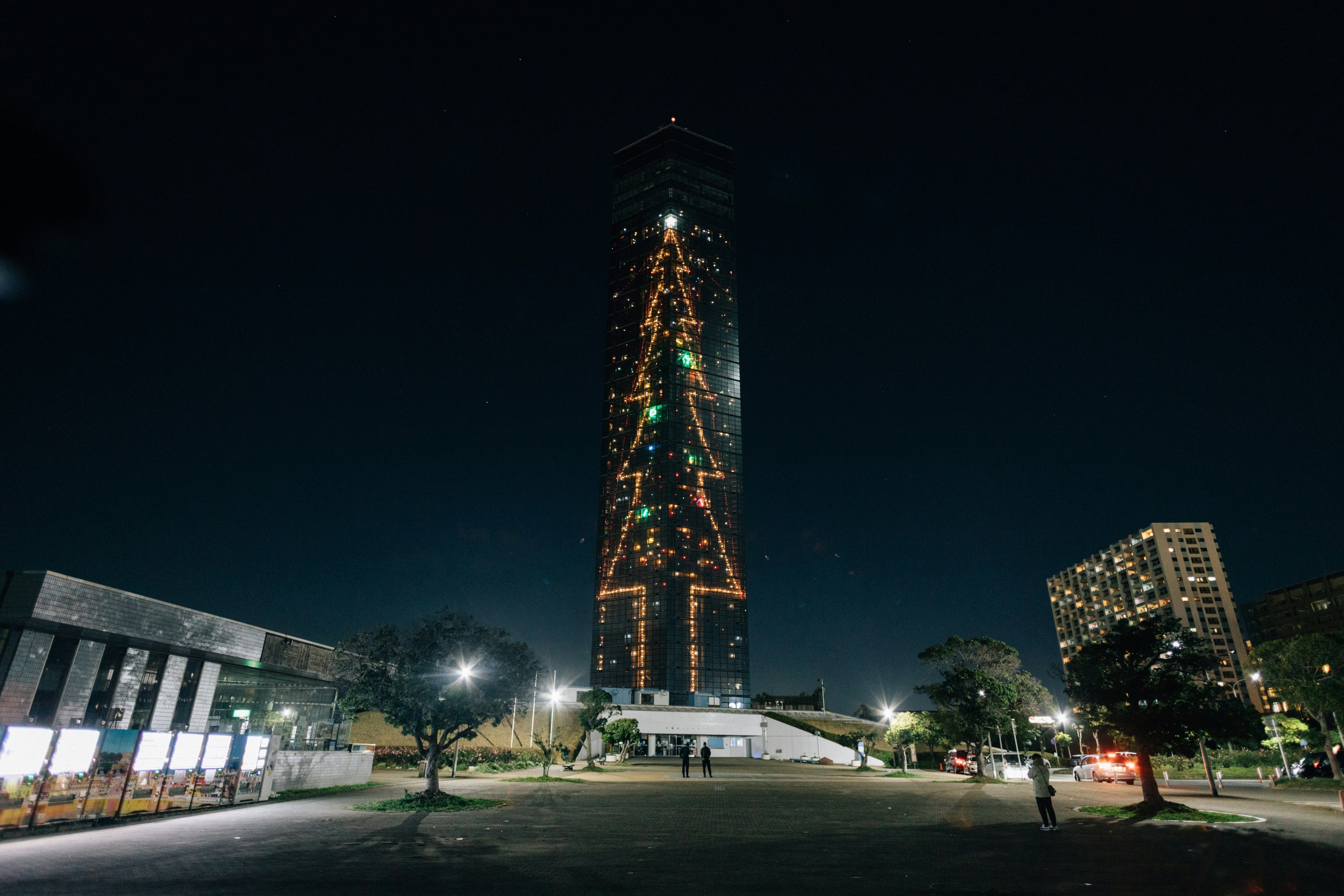 a very tall building with a lot of lights on it