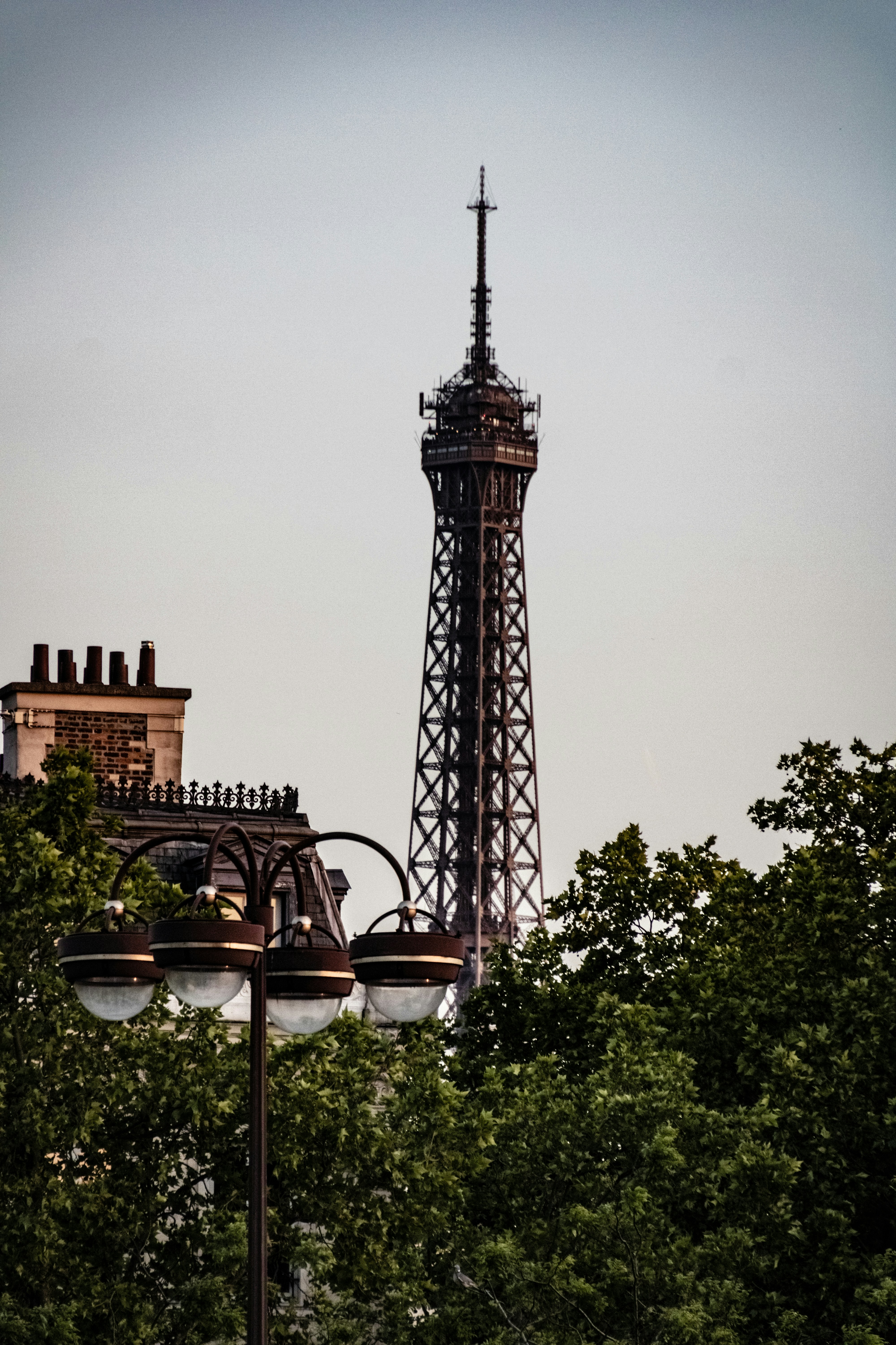 a very tall tower with a clock on it's side