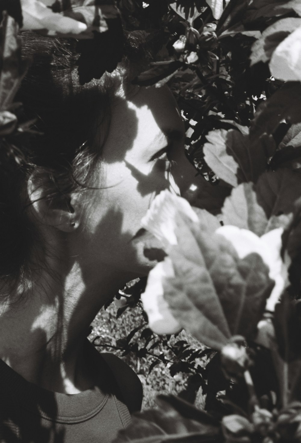 a black and white photo of a woman's face