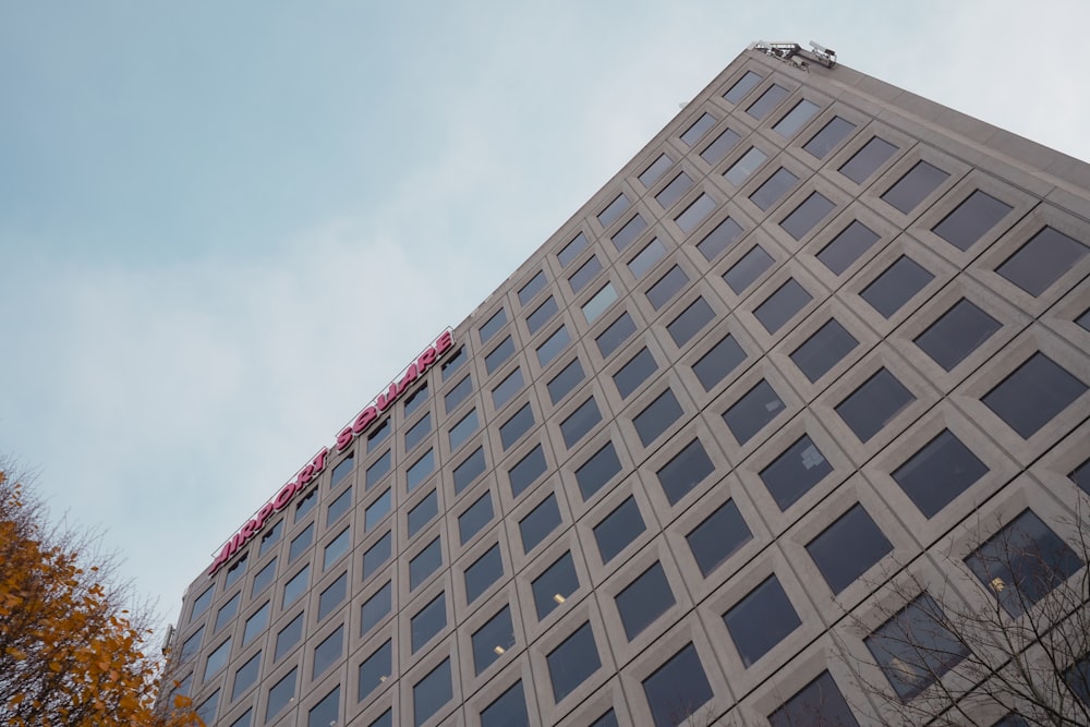 a very tall building with a sky background