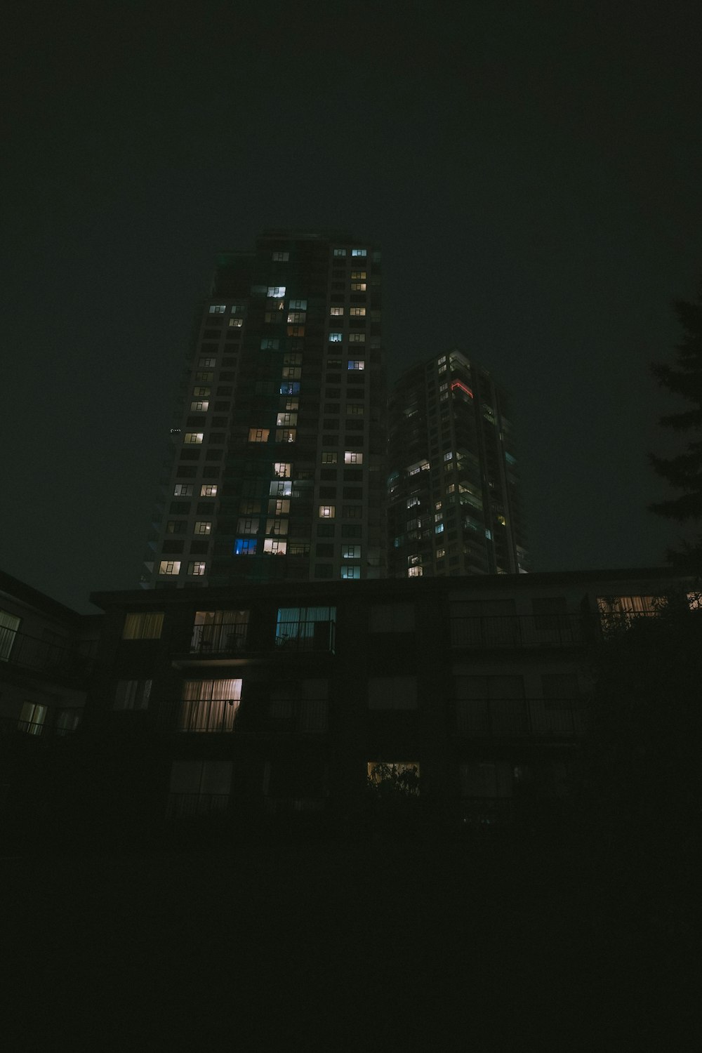 a very tall building lit up at night