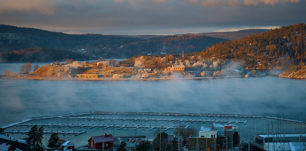 a view of a town and a body of water