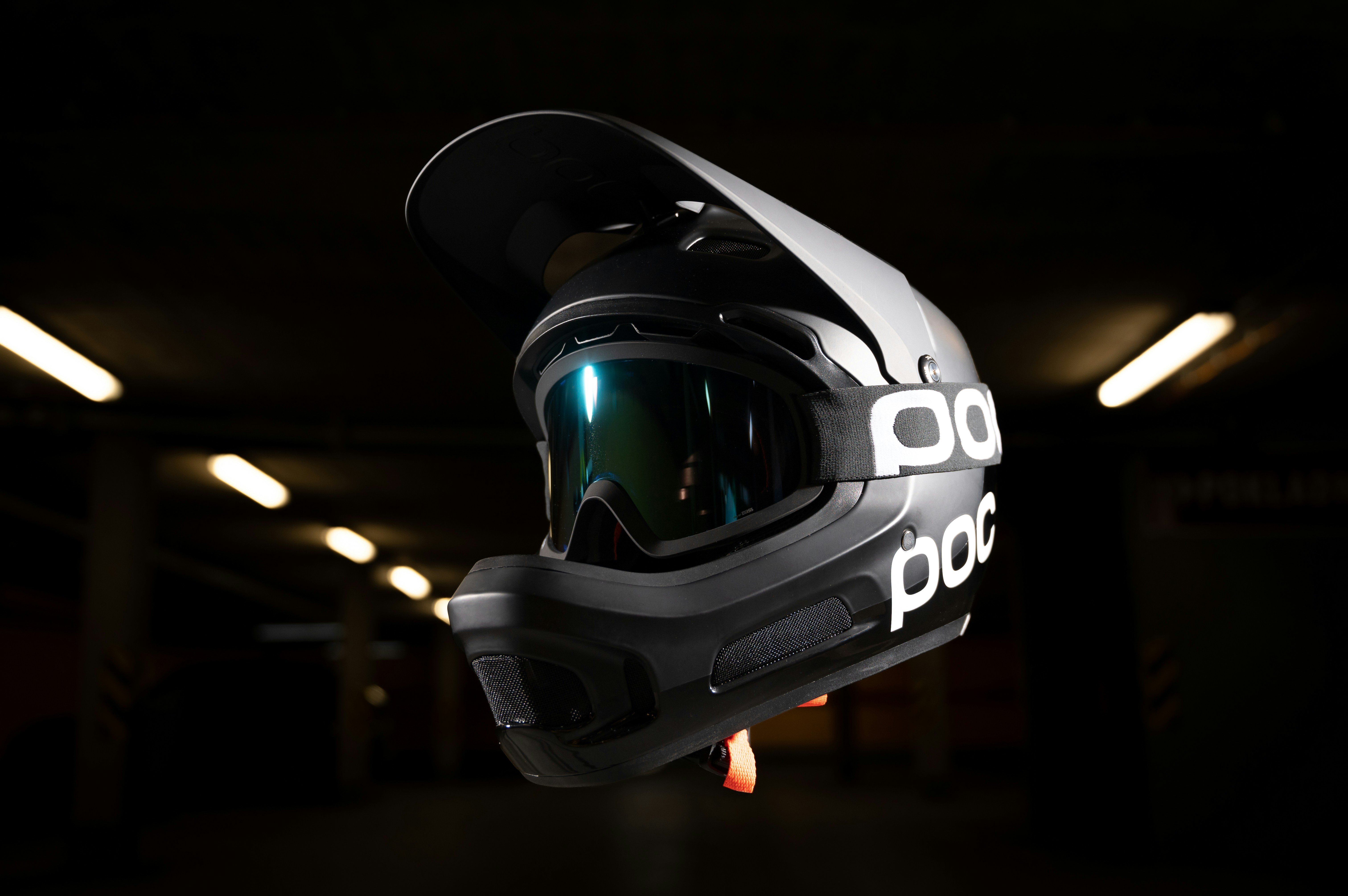 a helmet with goggles is shown in the dark