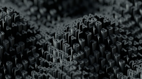 a black and white photo of a lot of numbers