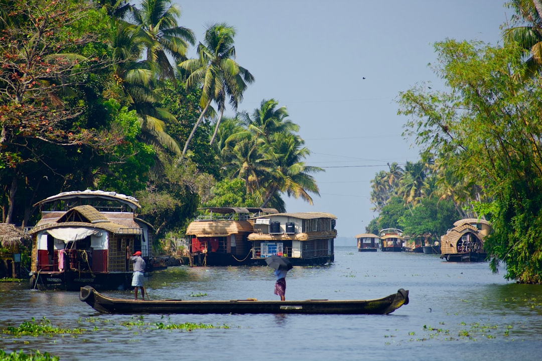 a person standing in a boat on a river,