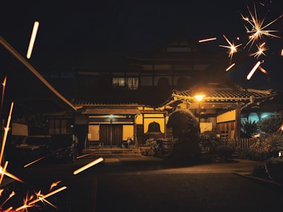 A beautifully renovated traditional Japanese house with modern lighting and open spaces.