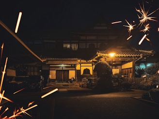 A beautifully renovated traditional Japanese house with modern lighting and open spaces.