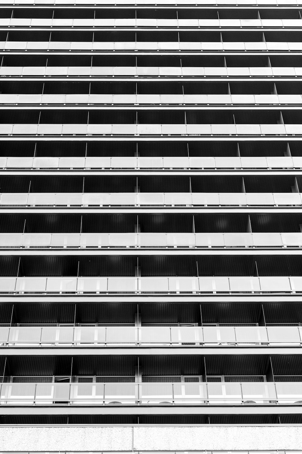 a black and white photo of a tall building