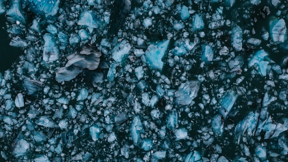 an aerial view of ice chunks and ice floes