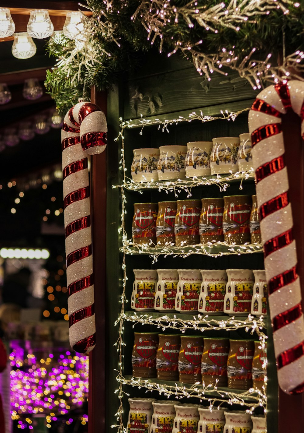 a shelf filled with lots of christmas food