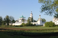 Peaceful scene of Mănăstirea Neamțului with its ancient walls and serene atmosphere.