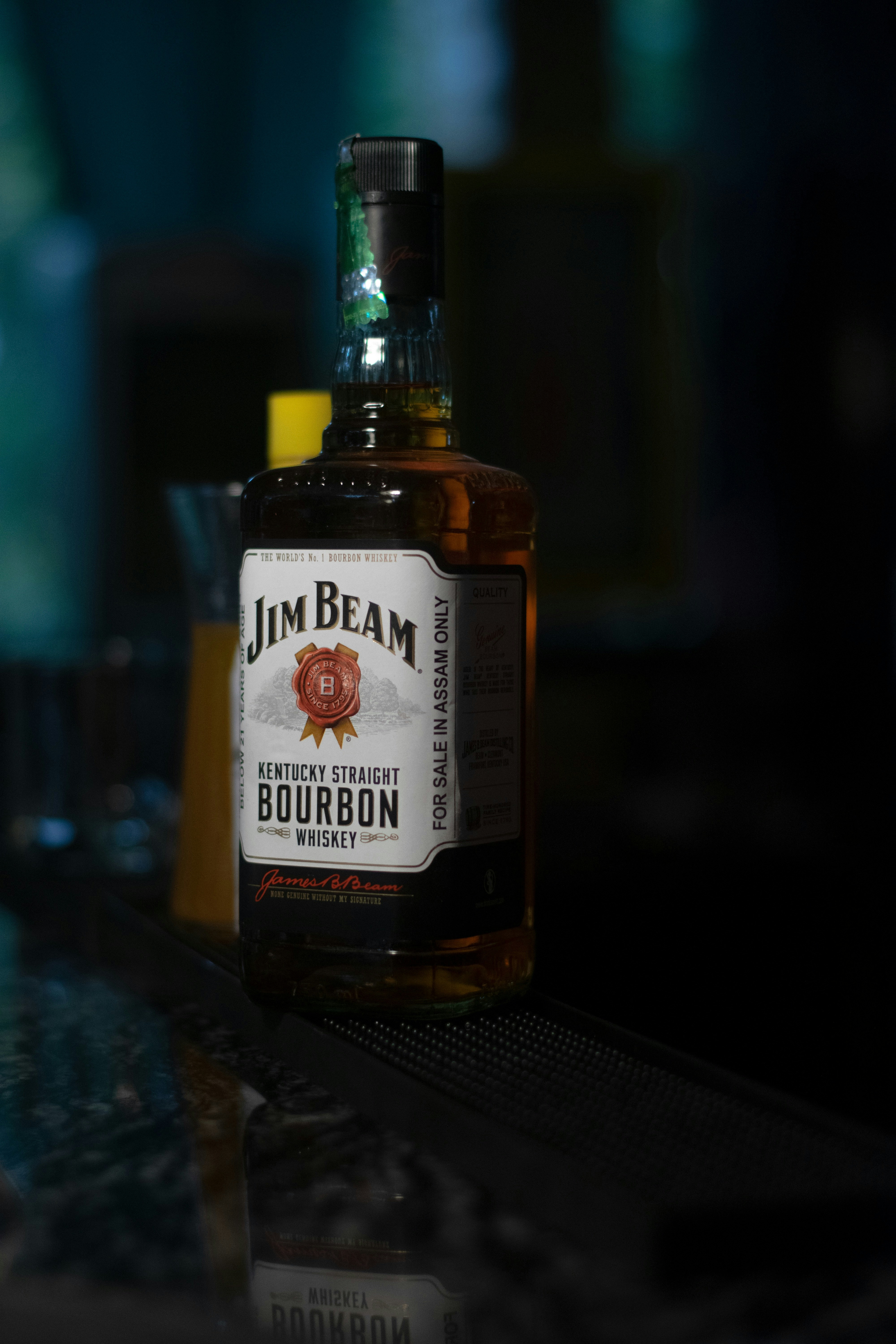 a bottle of bourbon sitting on top of a counter