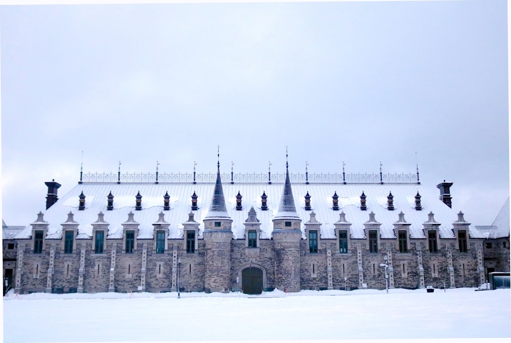 a large building with a lot of snow on top of it