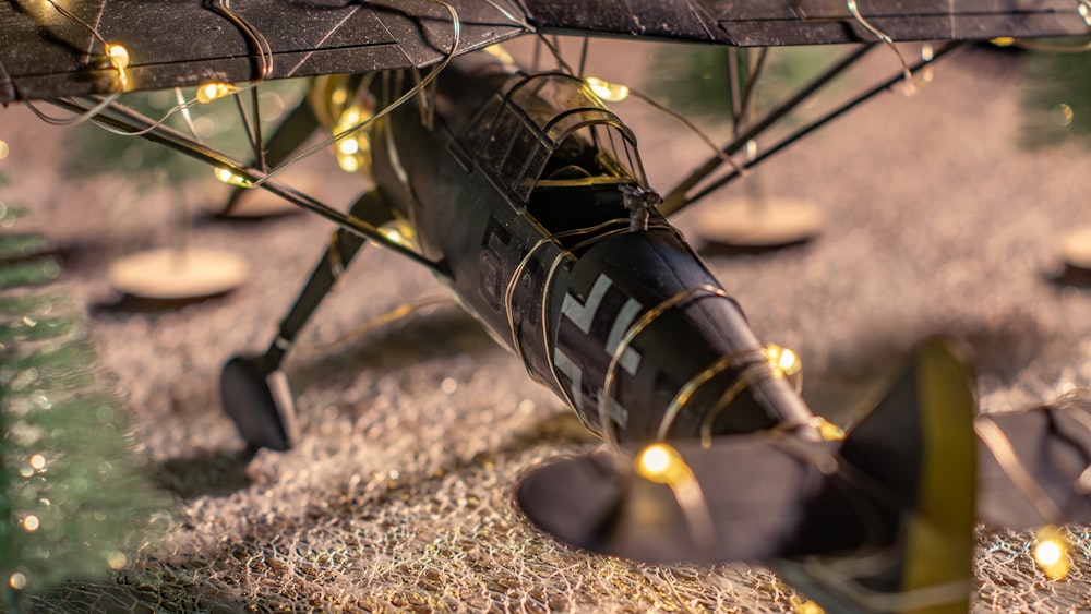 a toy airplane is sitting on the ground