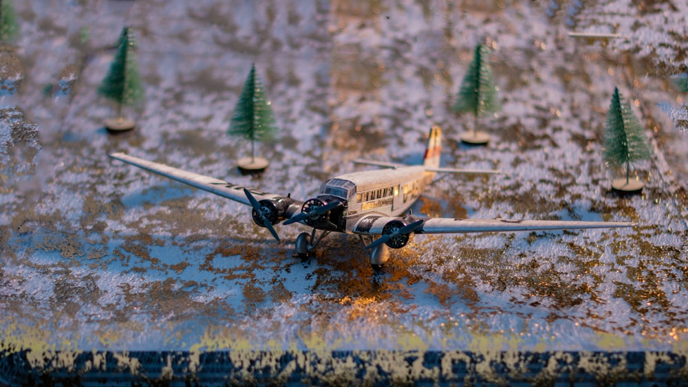 a toy airplane sitting on top of a table