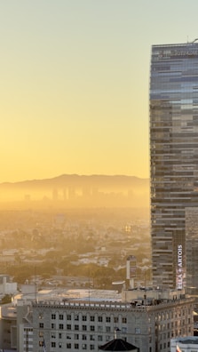 Sunset view of the Rio de Janeiro skyline, symbolizing the company's roots.