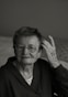 a black and white photo of an elderly woman