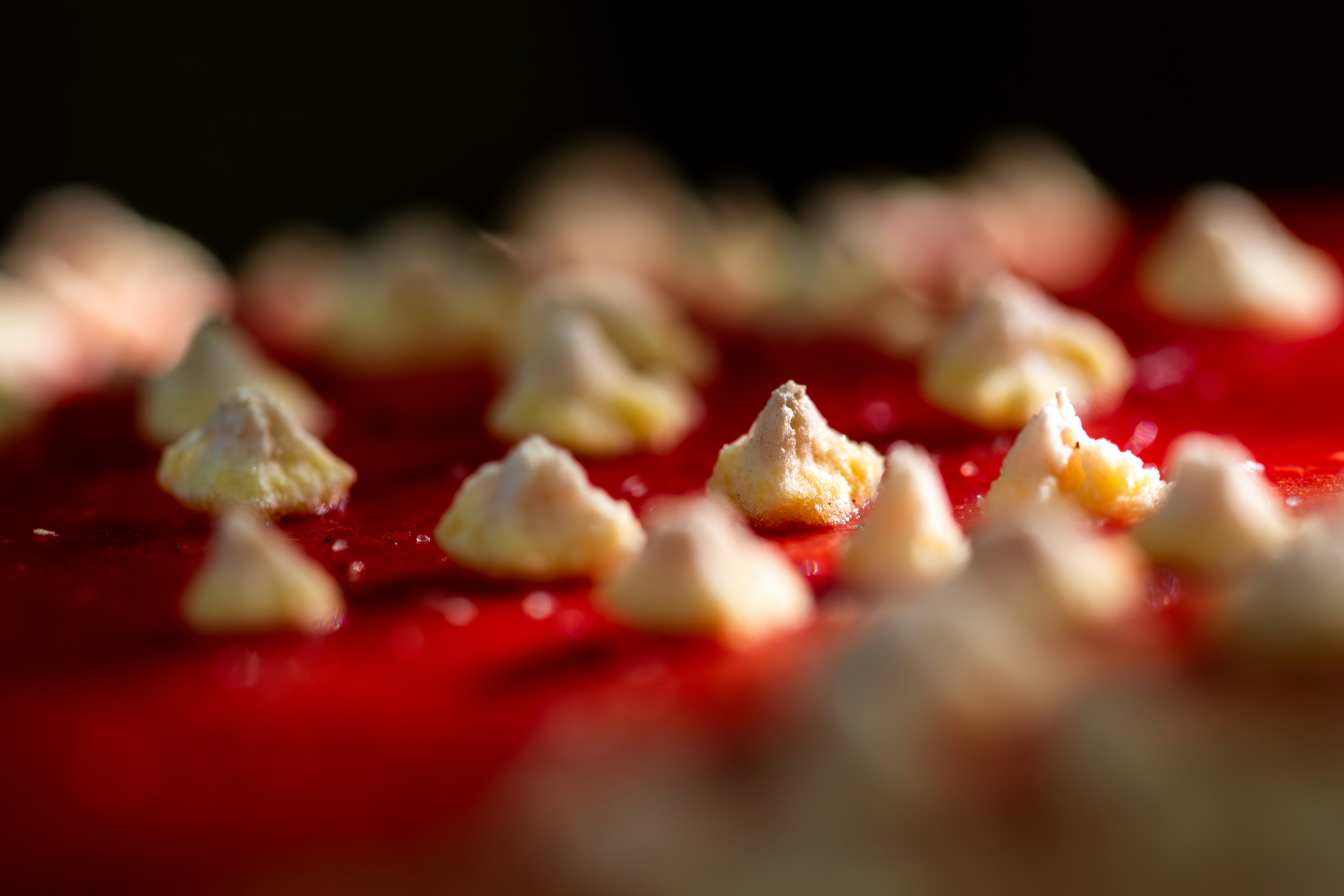 a close up of a plate of food with red sauce