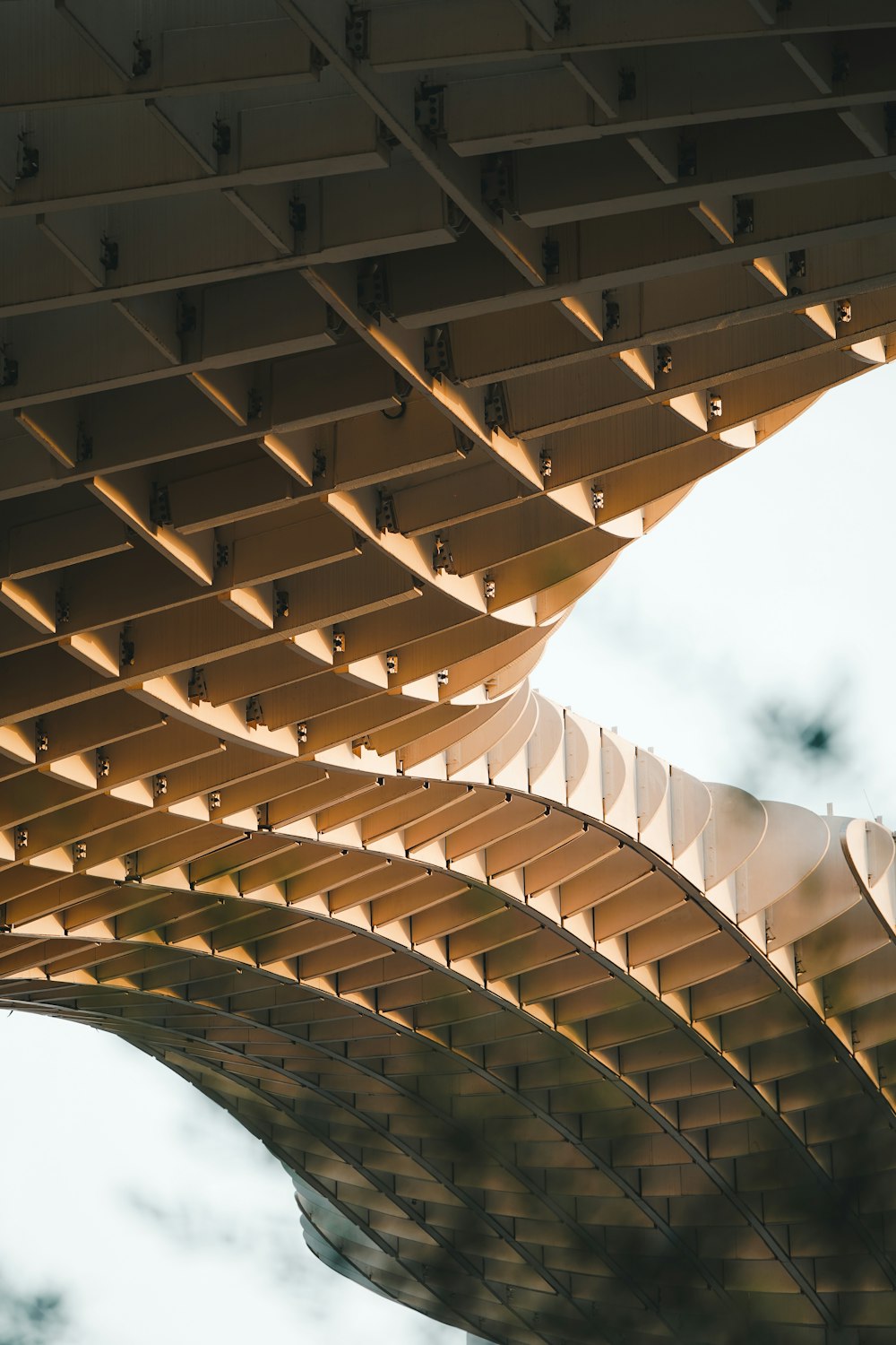 a close up of a structure with a sky in the background