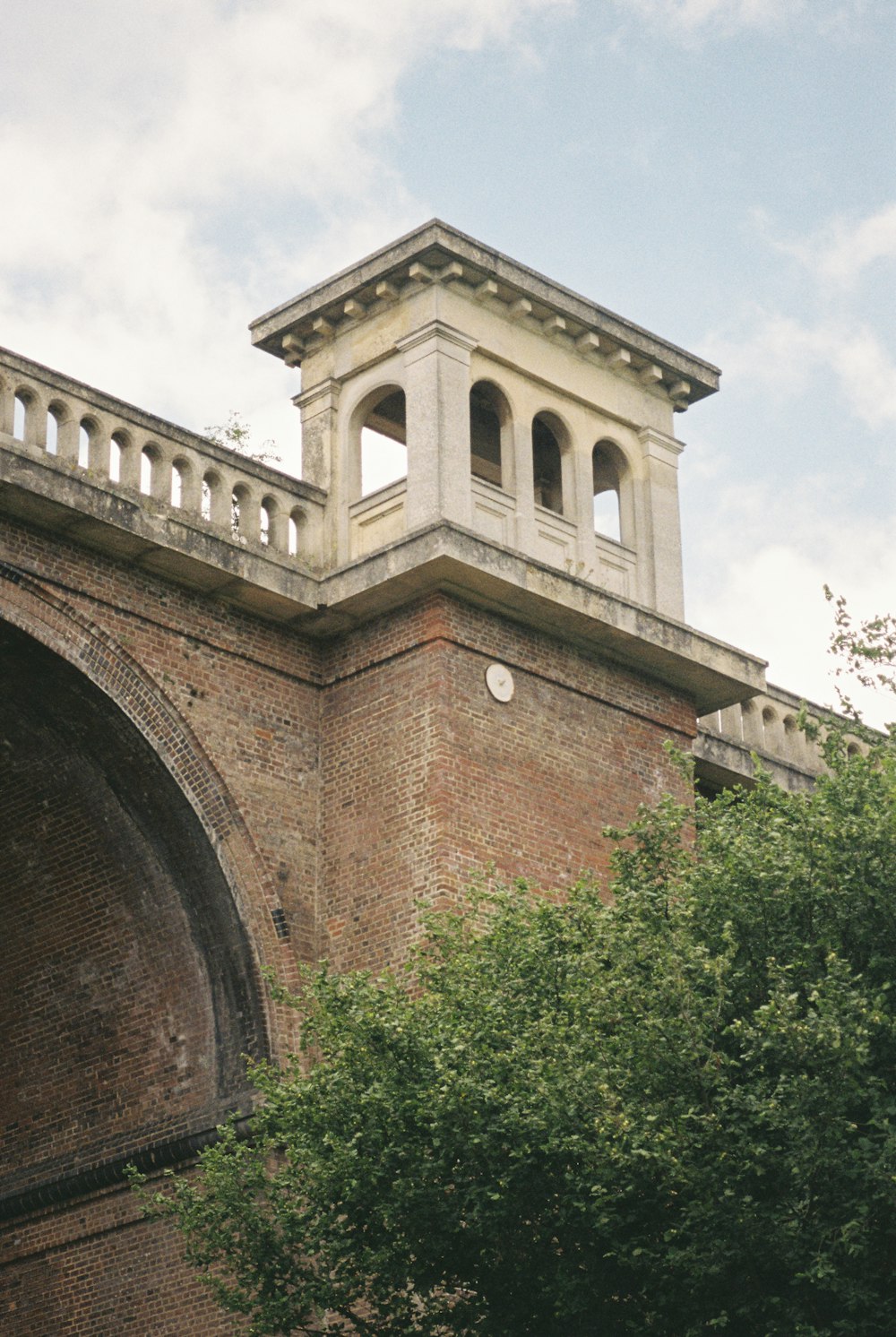 a clock tower on top of a brick building