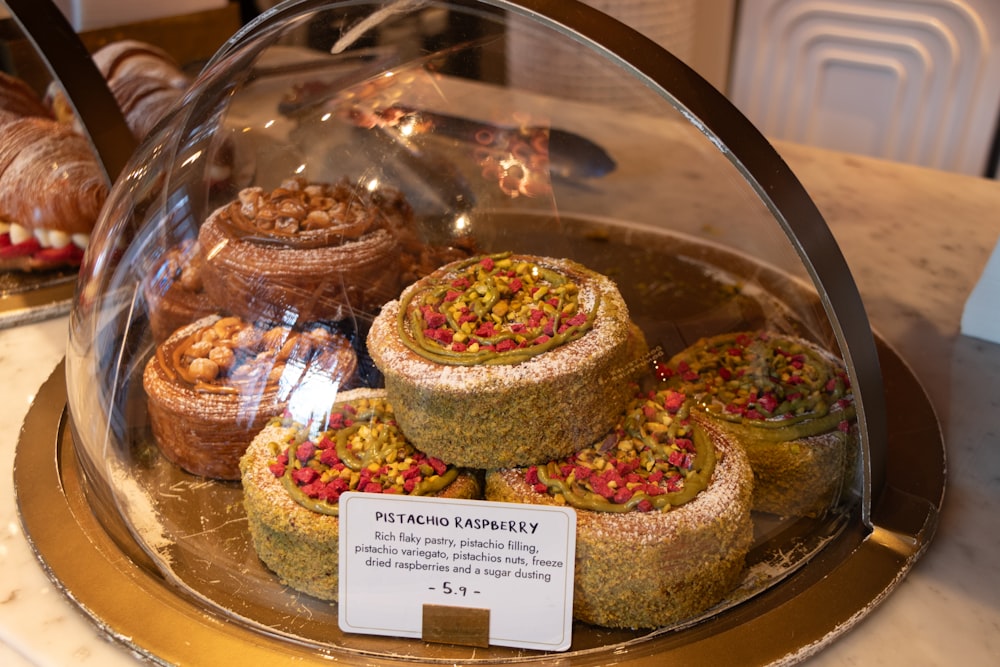 a display case filled with lots of different types of pastries