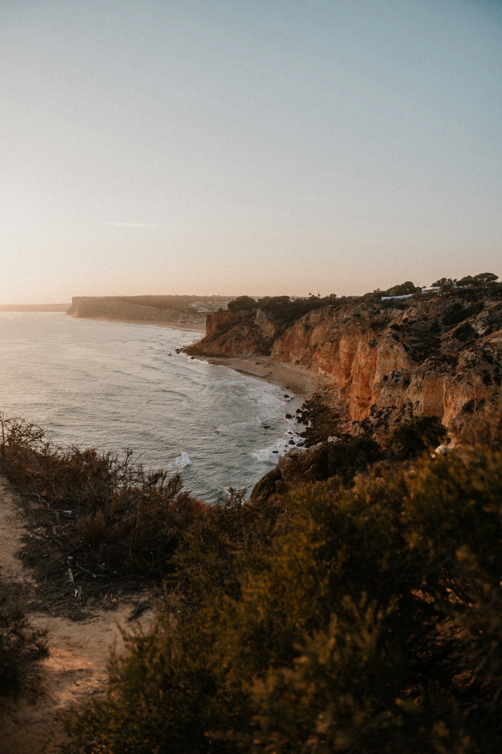 a view of the ocean from a cliff