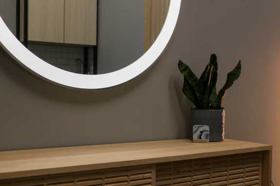Elegant modern mirror with LED lighting in a luxurious bathroom setting