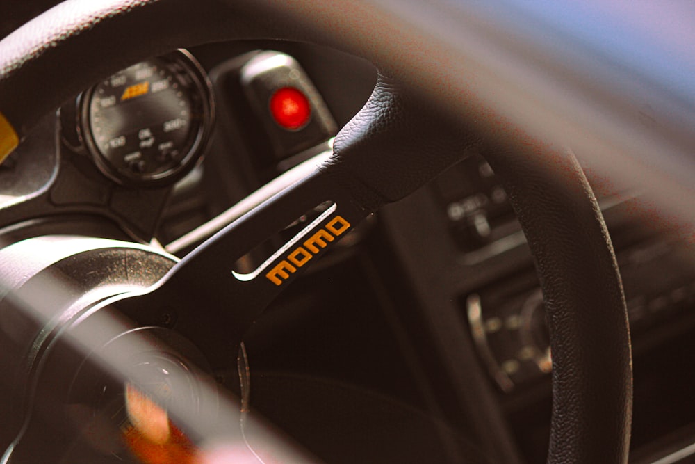 a steering wheel and dashboard of a car