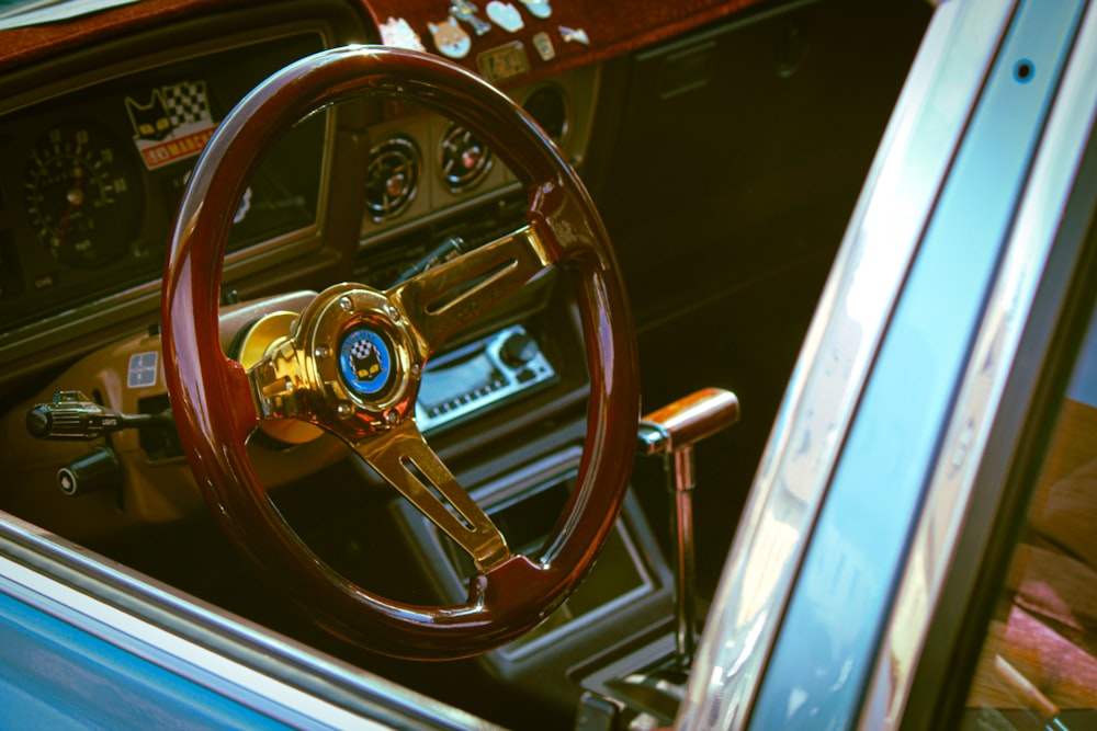 the interior of a car with a steering wheel