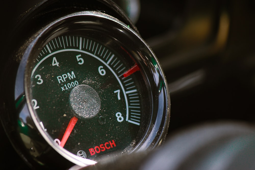 a close up of a speedometer in a vehicle