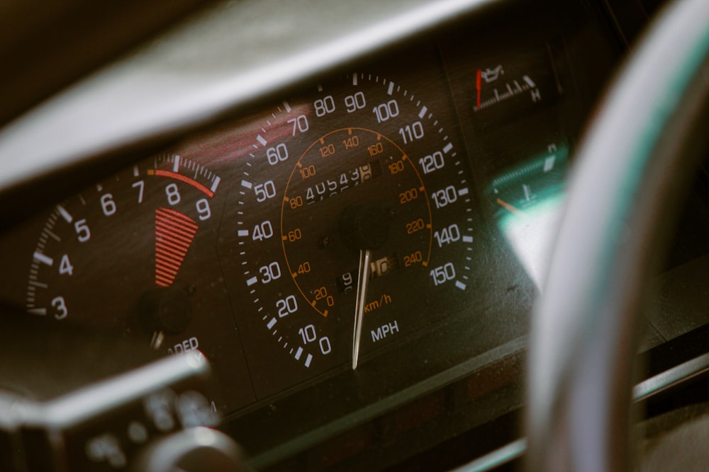 a close up of a speedometer in a vehicle