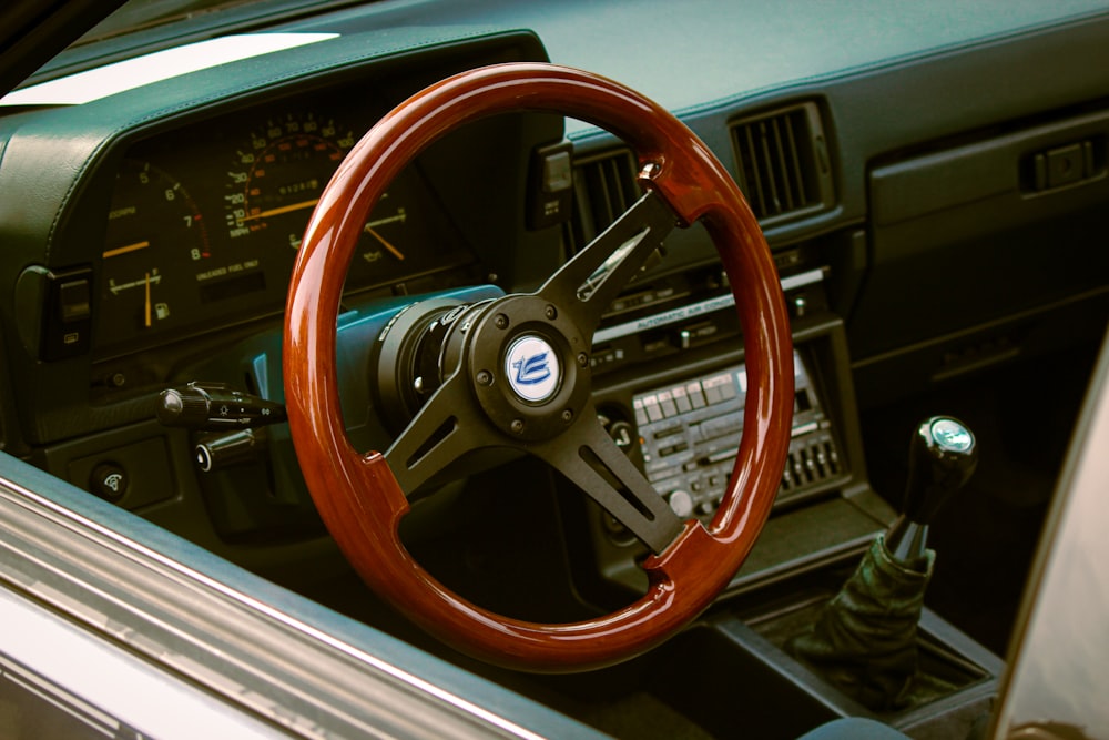 a steering wheel and dashboard of a car