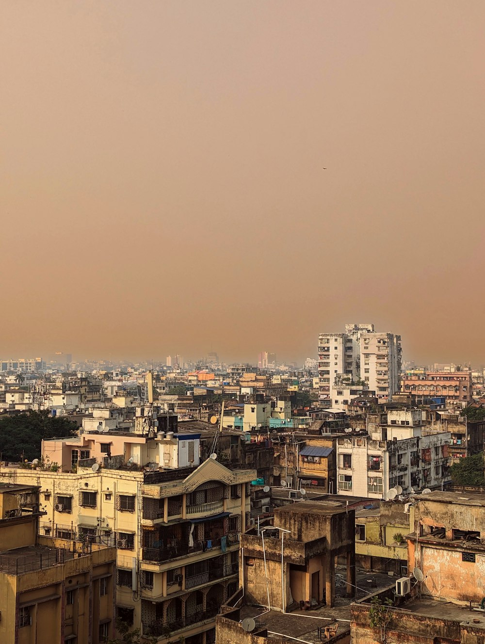 a view of a city with tall buildings