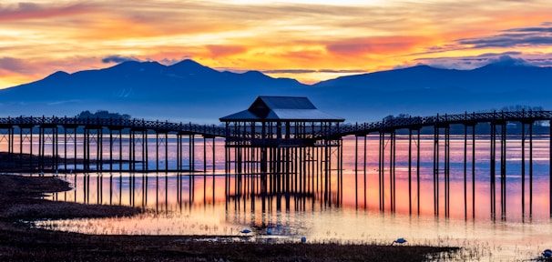 A picturesque sunset view over the lake during a wedding.