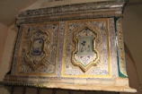 Close-up of a traditional ceramic tile pattern found in Jaén's historic monuments.