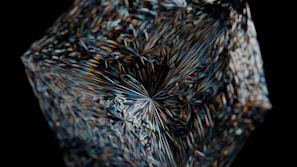 Abstract golden geometric pattern on black obsidian background representing clarity and precision