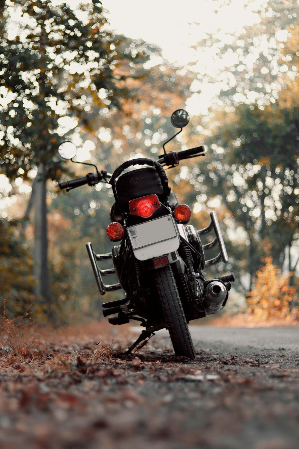 a motorcycle parked on the side of a road