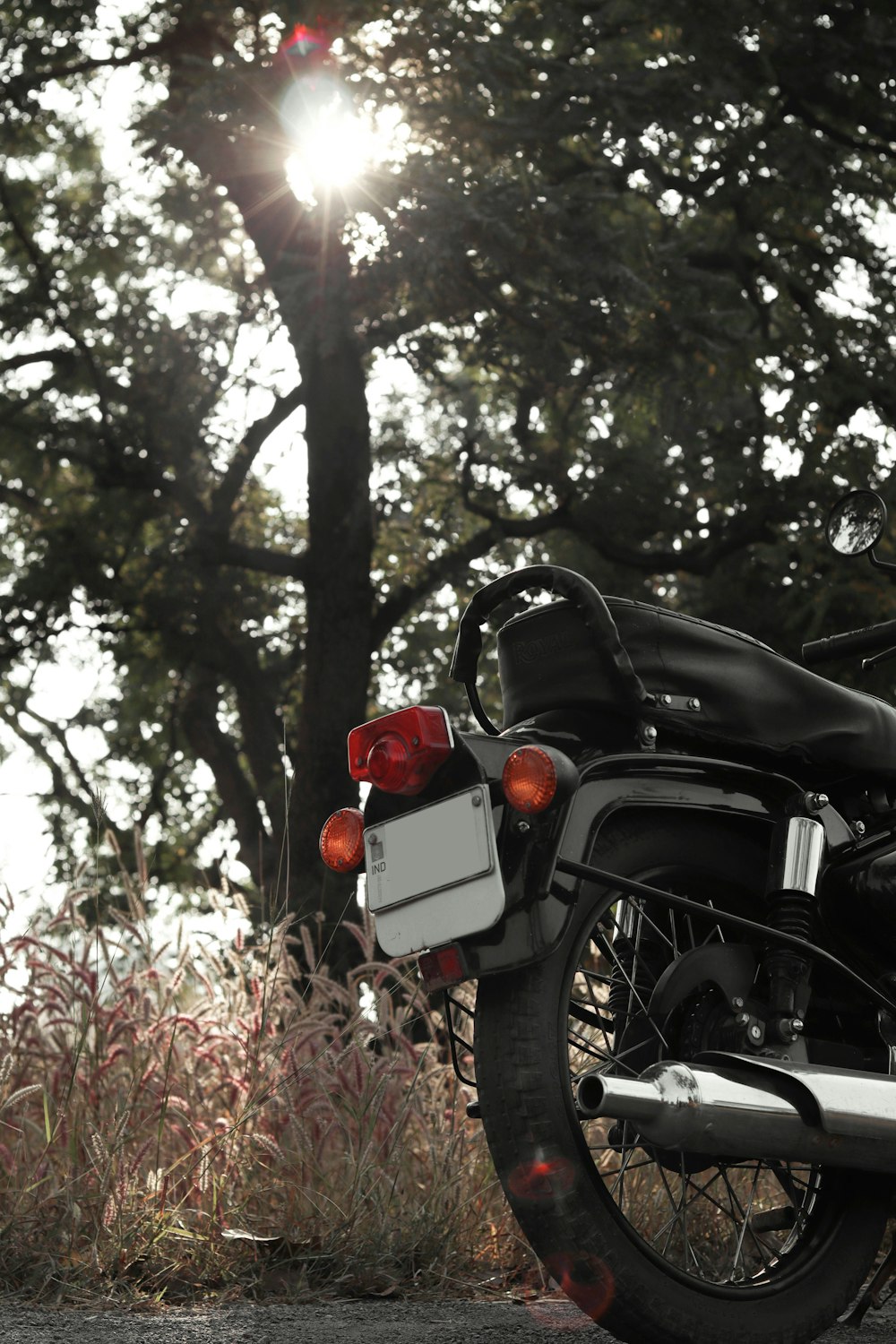 a motorcycle parked on the side of the road