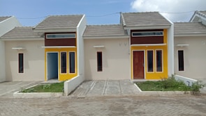 a couple of small houses sitting next to each other