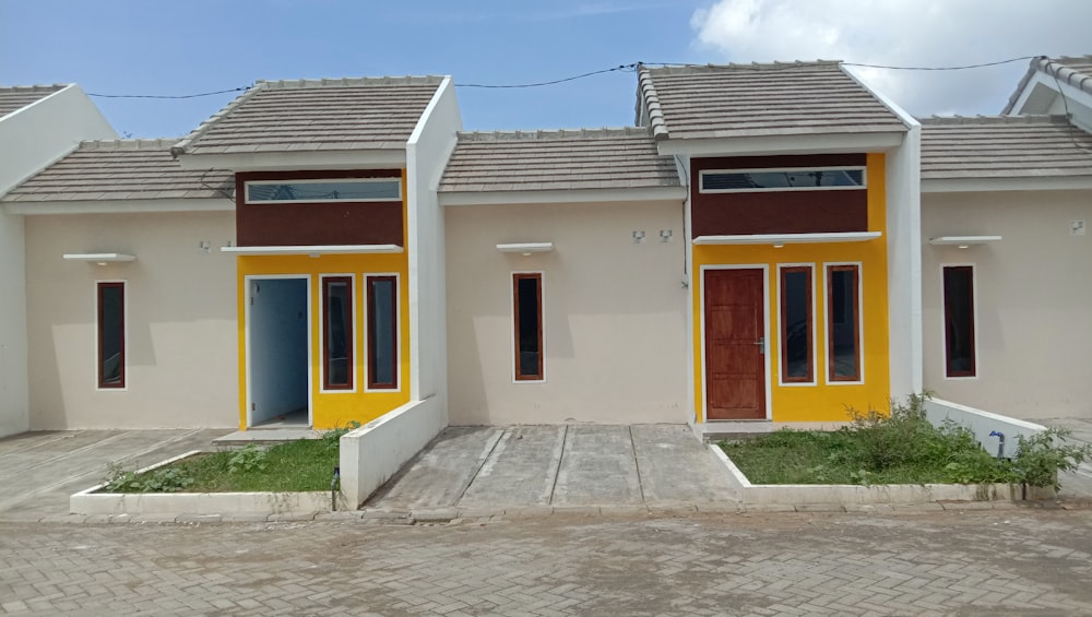 a couple of small houses sitting next to each other