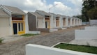 a row of small houses sitting next to each other