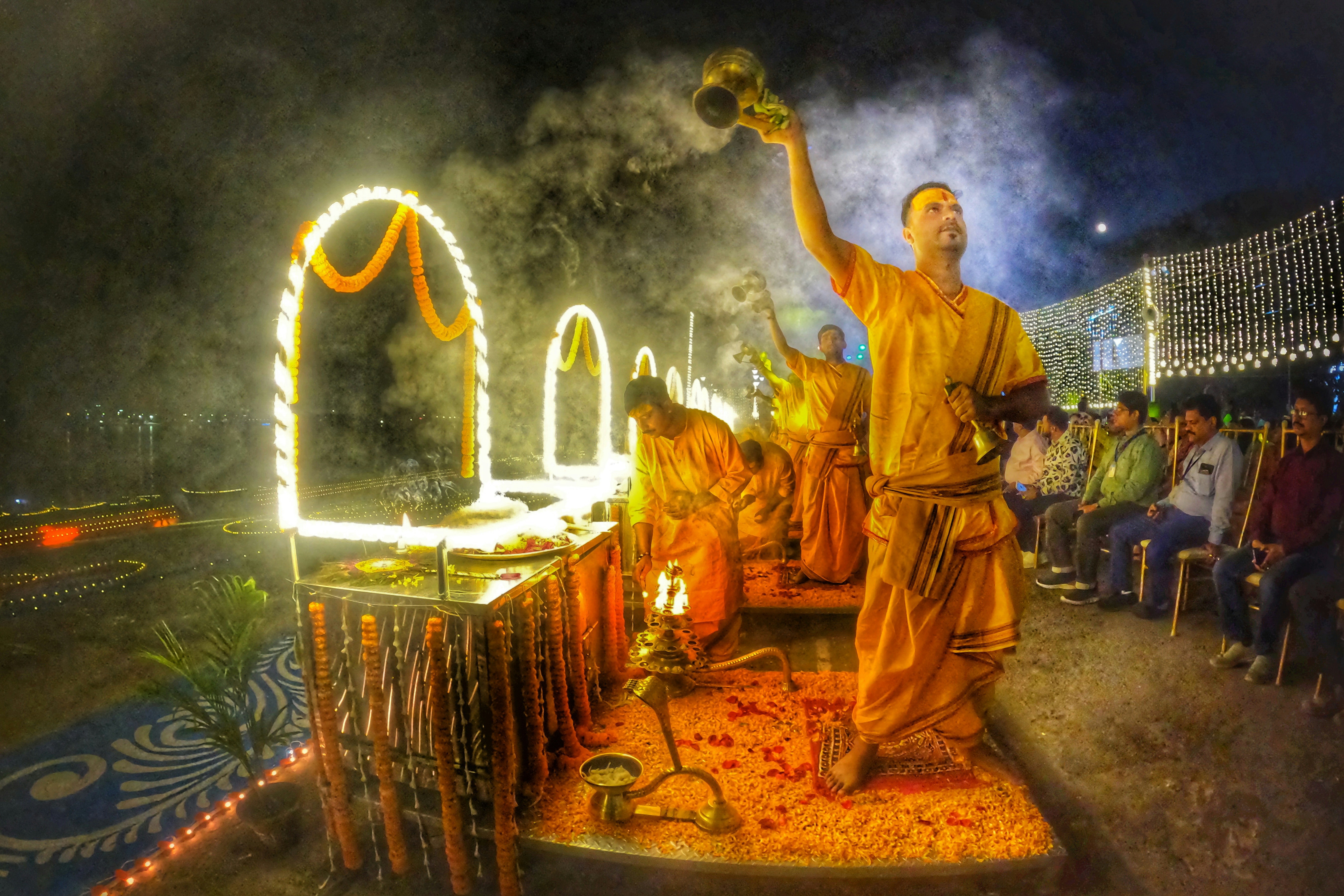 a group of men standing next to each other on a stage