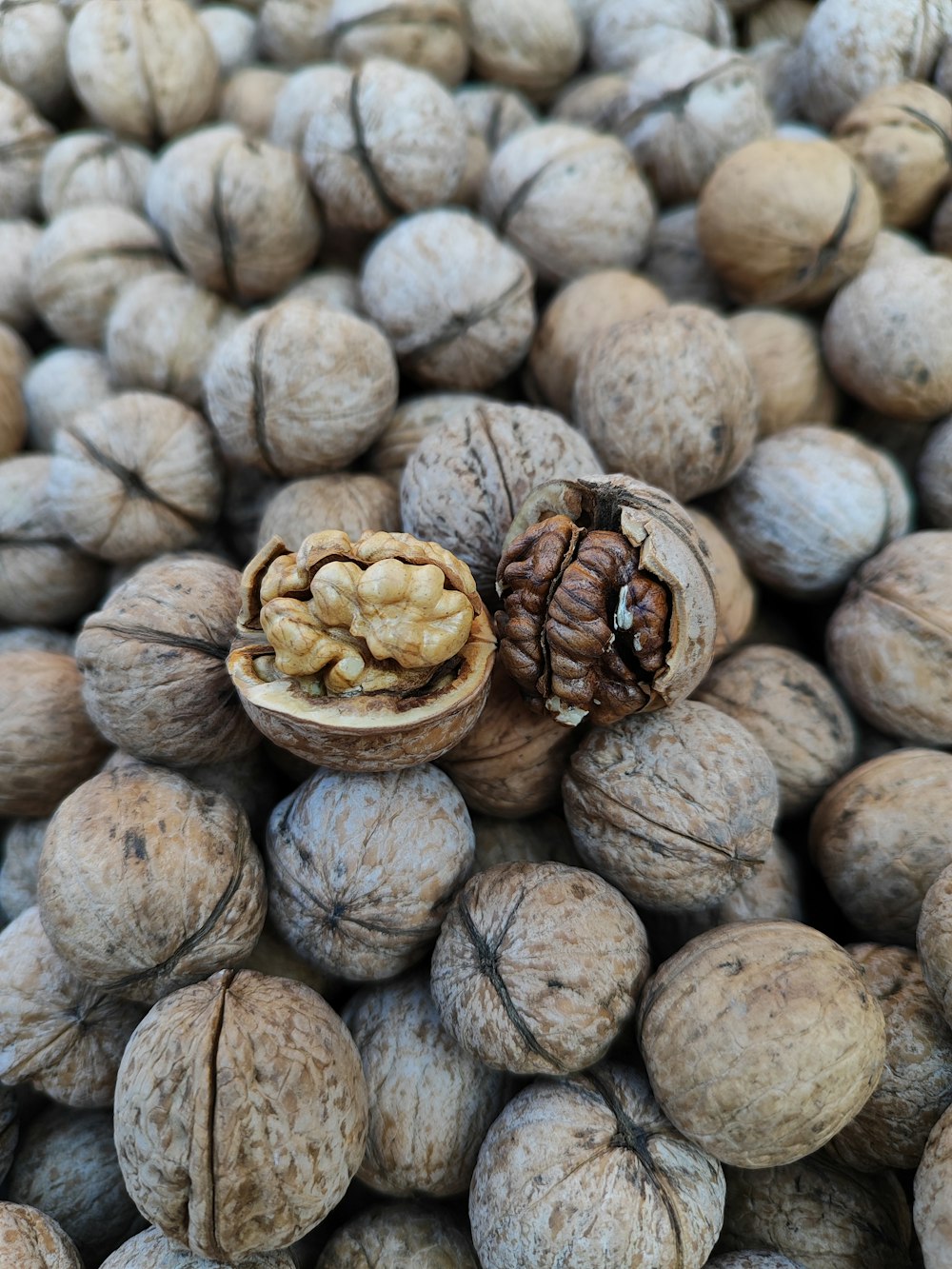 a bunch of nuts that are on top of each other