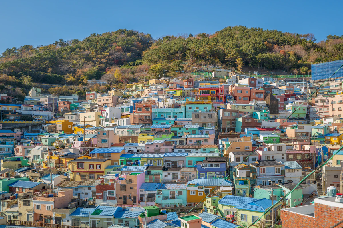 The colorful stacked houses of Gamcheon Culture Village on its hillside in Busan