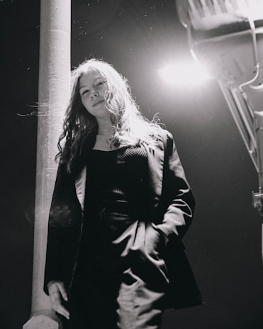 A vibrant street portrait capturing candid emotions under soft morning light.