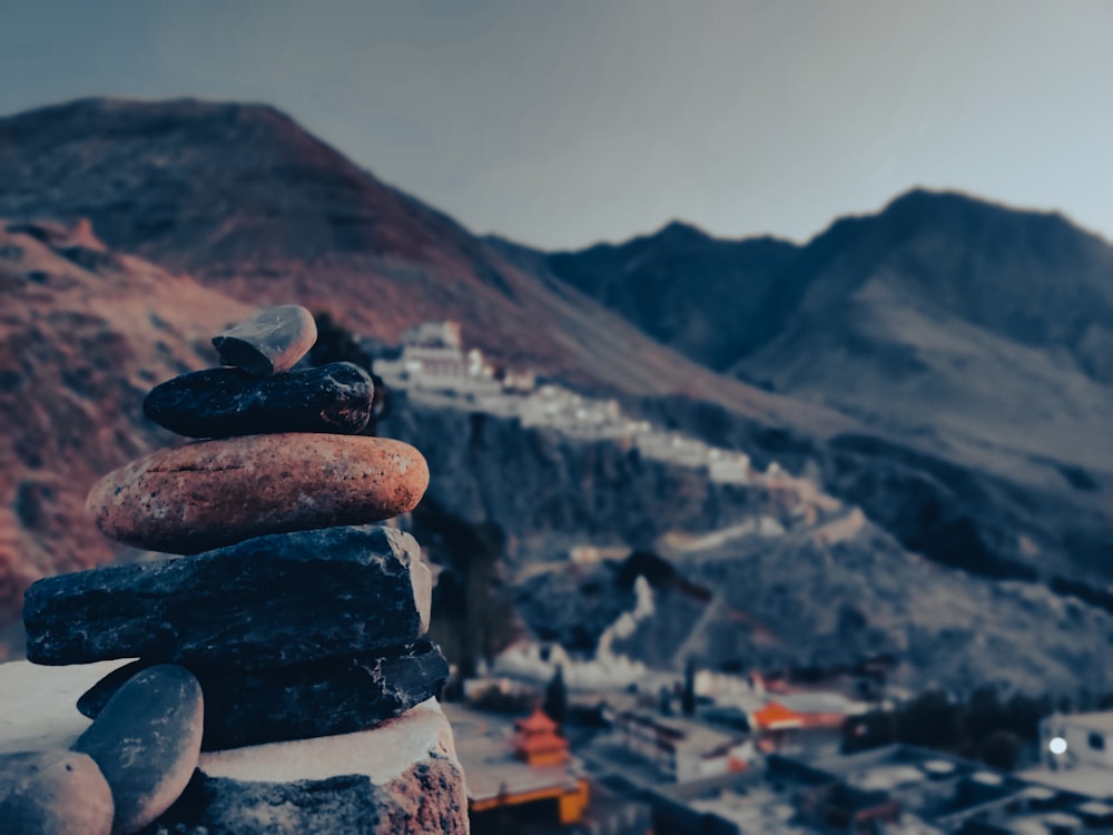 a pile of rocks sitting on top of a mountain