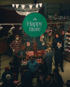 A family happily browsing through mark & spark’s boutique-style store, surrounded by festive celebration products.