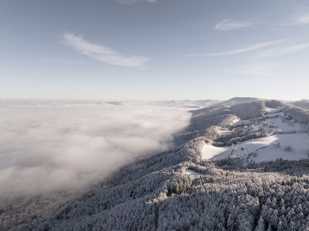 an aerial view of a snow covered mountain