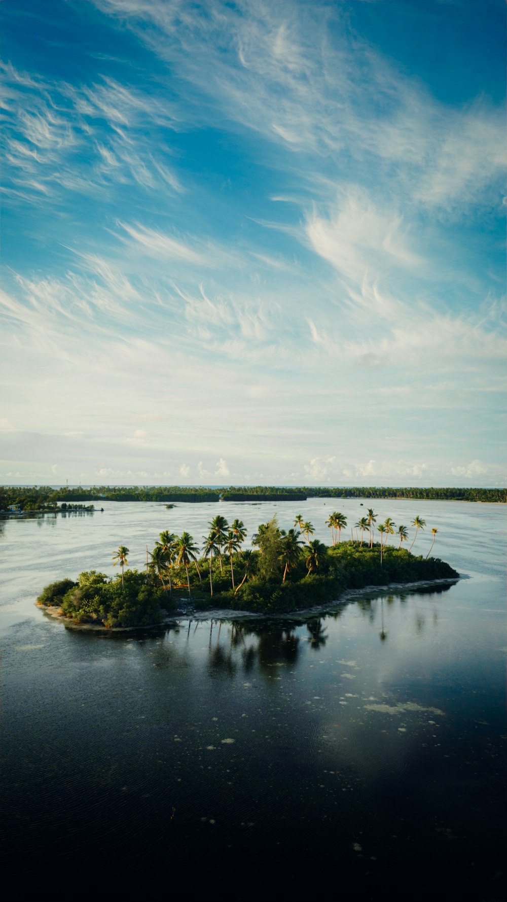 a small island in the middle of a body of water